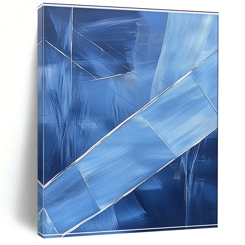 Contemporary hand-painted abstract art featuring blue shapes overlapping with soft edges and textured brushstrokes accented by a large white frame on the canvas. DLZ0367