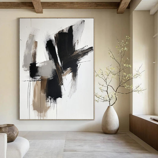 Contemporary hand-painted abstract artwork features bold black shapes with brown tones and white accents on a sleek neutral backdrop. DLZ0316