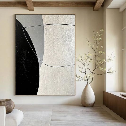 Contemporary abstract painting features bold black and white lines with smooth curves against a large gray background, showcasing minimalist geometric shapes and high contrast lighting. DLZ1654