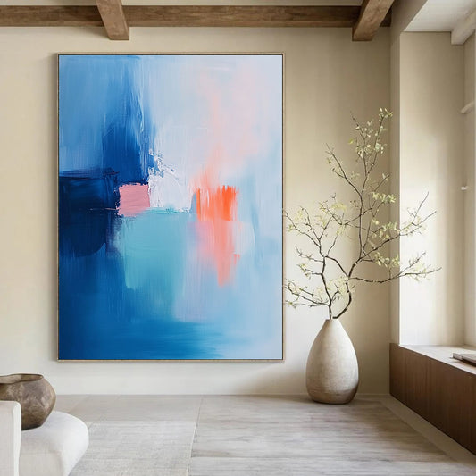 Contemporary hand-painted abstract art featuring soft brush strokes in light blue pink and white with navy blue and orange accents. DLZ1053