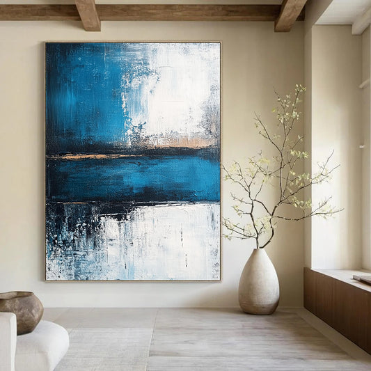 Contemporary abstract painting showcasing a serene blue sea with deep gray strokes and light white accents, evoking tranquility and strength. DLZ0360