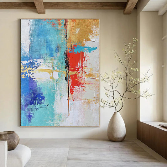 Contemporary hand-painted abstract art showcasing urban landscapes with textured brush strokes in soft neutrals and vibrant blue and red highlights DLZ0511
