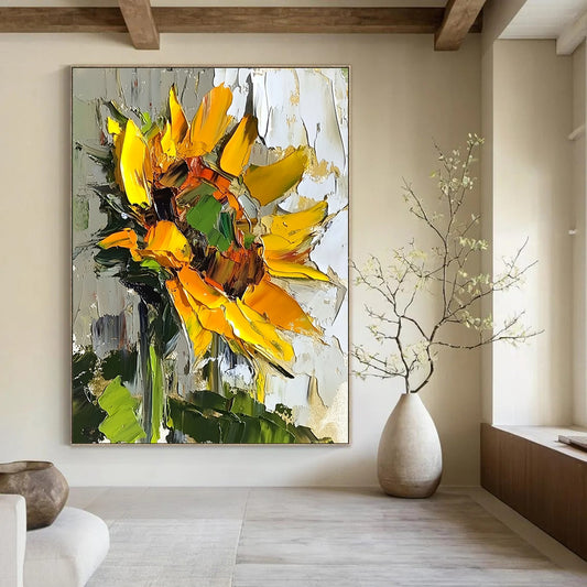 Vibrant abstract sunflower oil painting with bold brush strokes and textured surface in natural light against a soft green leaf backdrop. DLZ1664