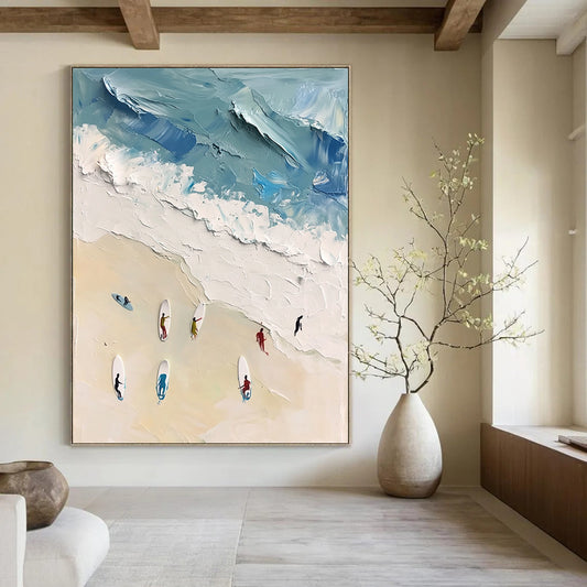 Large contemporary abstract artwork featuring vibrant acrylic colors capturing surfers in motion against a white sand beach backdrop in soft blues and greens. DLZ0842