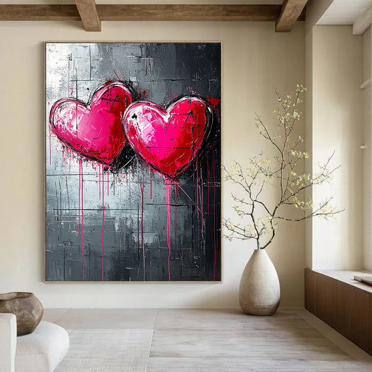 Bold contemporary abstract art featuring three pink and red hearts on a textured dark grey backdrop with dripping paint lines inspired by graffiti style. DLZ0263