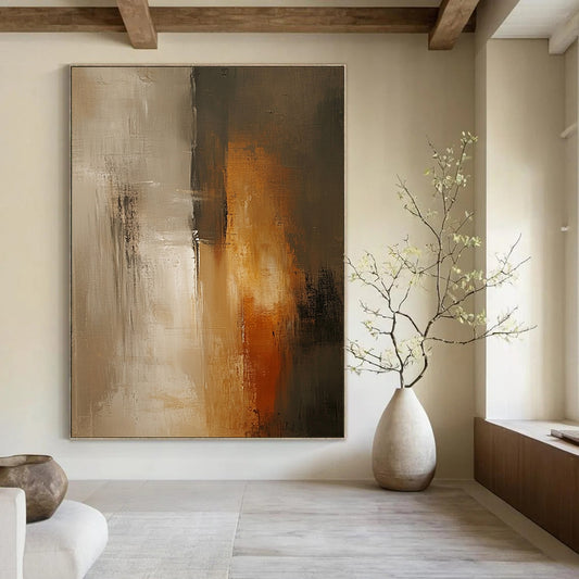 Contemporary abstract painting with soft beige and grey tones features tall vertical elements, blurred edges, and a textured surface against a dark gray wall. DLZ0560