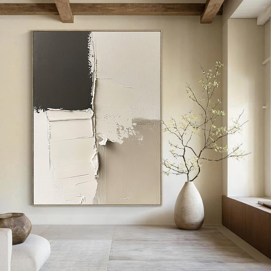 Contemporary abstract artwork features striking black and white impasto shapes and minimalist lines on a canvas with deconstructed paper elements in neutral tones. DLZ0524