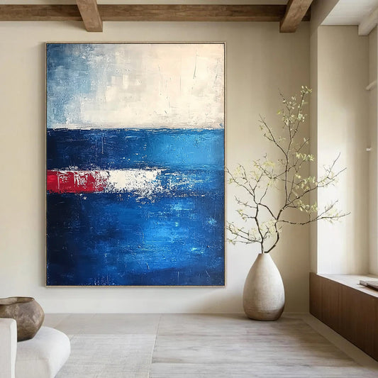 Modern abstract artwork featuring deep blues and dark grays with thick textured brushstrokes creating an atmospheric horizon in a serene minimalist composition. DLZ0365