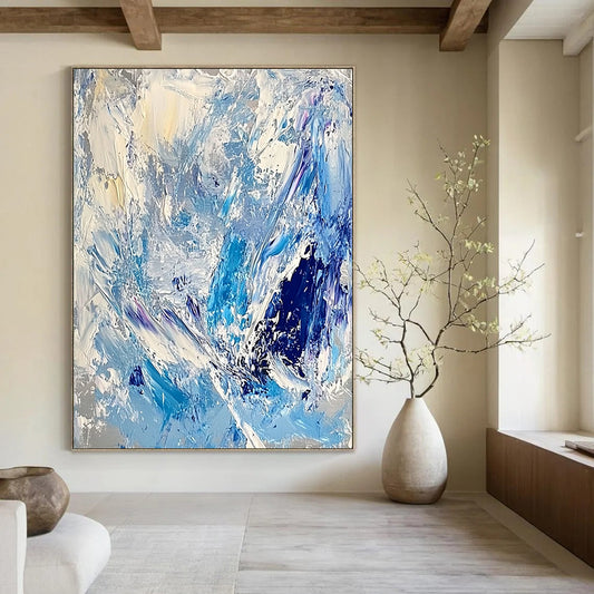 Contemporary large abstract artwork featuring thick impasto strokes in light blue, white, and silver, evoking the essence of ice and snow. DLZ0624