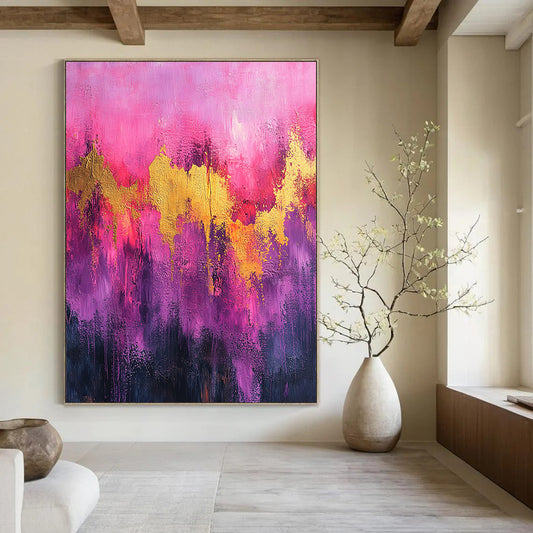 Contemporary abstract artwork featuring vibrant pink and purple tones with gold accents and dynamic splatter drips on textured canvas. DLZ0909