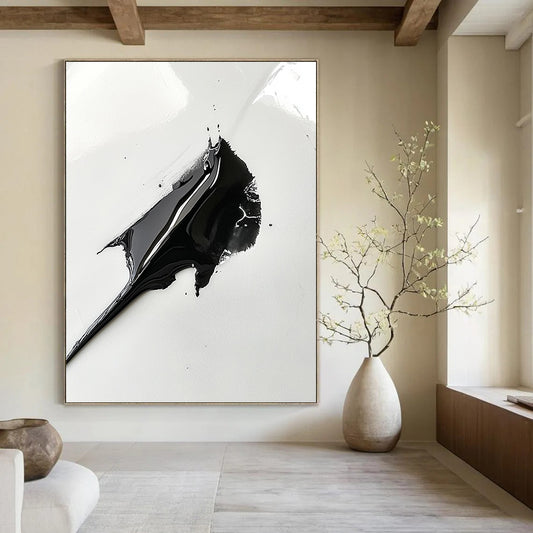 Contemporary abstract art featuring a black paint spread resembling a shark's fin on a white background capturing intricate details with a macro lens effect. DLZ1556