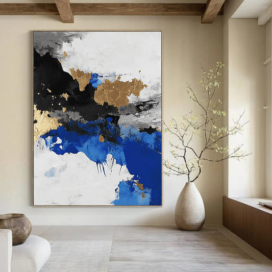 Contemporary abstract artwork showcasing an aerial view of an arctic landscape in black and white with blue accents and gold leaf highlights. DLZ0572