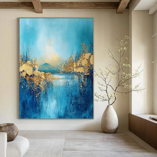 Contemporary large abstract painting features textured fringe with a landscape illuminated by golden light and adorned with gold foil accents. DLZ0345