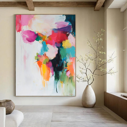 Contemporary abstract painting features soft colors in brush strokes and shapes on a white background with pinks reds greens yellows and blues. DLZ0687
