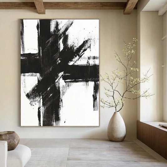 Contemporary abstract painting features a bold black and white cross with striking brush strokes on a bright canvas. DLZ0271