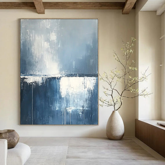 Contemporary hand-painted abstract art featuring misty clouds and rain over the ocean in soothing blue and grey tones with soft white edges. DLZ0630