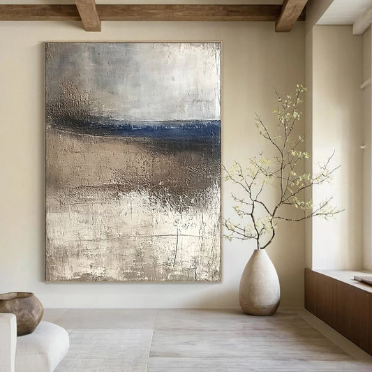 Contemporary abstract artwork featuring textured canvas with weathered hues of blue and brown evoking serene coastal landscapes and tranquility in a minimalist style. DLZ0445
