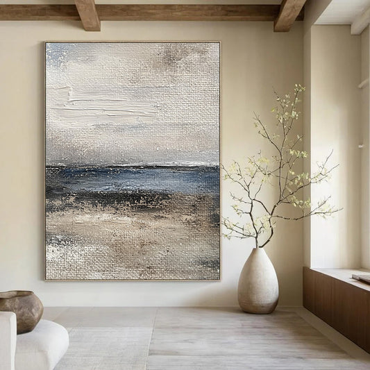 Contemporary abstract painting captures the ocean's essence with textured brushstrokes in muted gray and blue tones for a vintage feel. DLZ1077