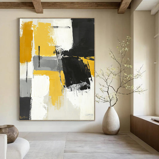 Contemporary hand-painted abstract art featuring black gray and yellow color blocks with brushstrokes on a neutral toned white background. DLZ0731