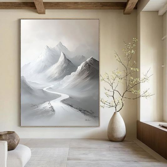 Contemporary large hand-painted abstract artwork featuring snow-covered mountains with a minimalist white palette and elegant brushstrokes on a gray background. DLZ1417