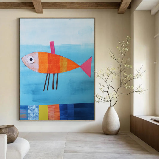 Contemporary abstract artwork features a paper fish in blue water with colorful details and textured fins against a playful backdrop. DLZ1260