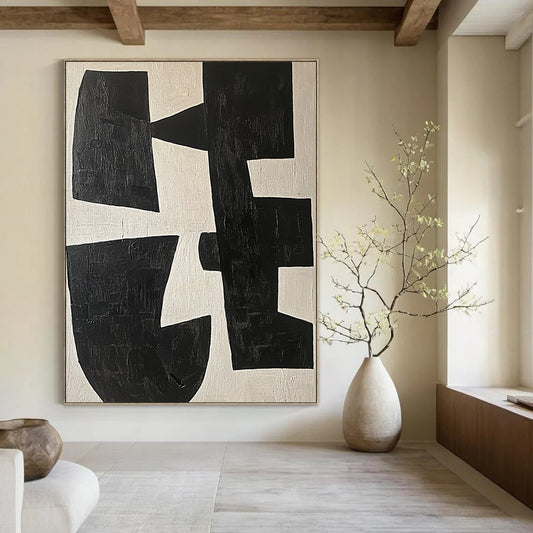 Large contemporary abstract painting featuring black and white shapes on a light beige background highlighting geometric forms and elegant movement. DLZ0509
