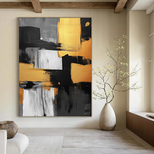 Contemporary abstract artwork featuring black white and yellow brush strokes with gold accents on a textured gray background and geometric shapes. DLZ1560