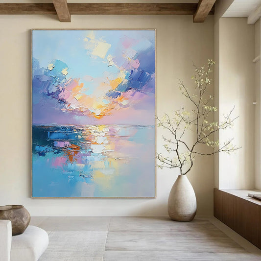 Contemporary hand-painted abstract artwork capturing a serene sunset over the sea with textured clouds and soft reflections in pastel colors. DLZ1684