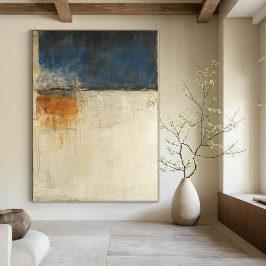 Contemporary abstract painting features a beige and blue palette large brush strokes and moody landscape with earthy tones and white spaces. DLZ0695