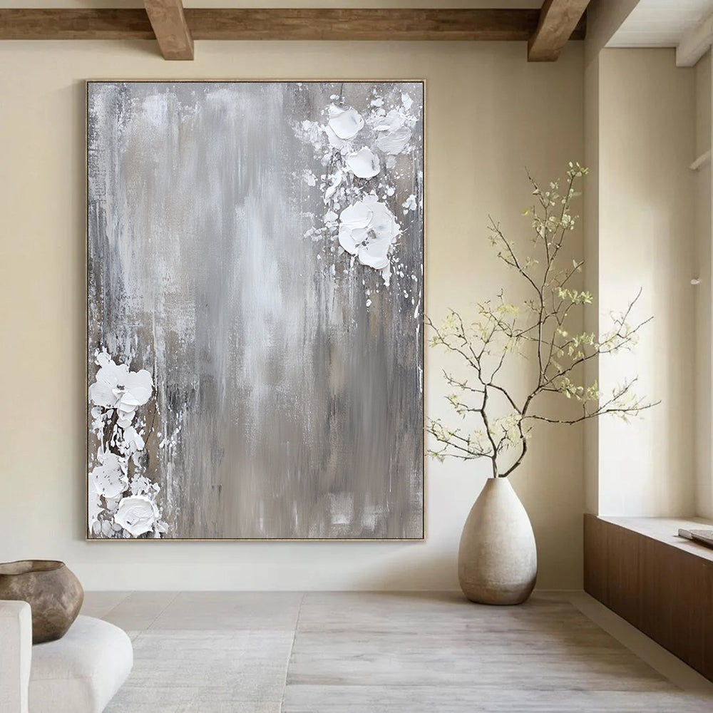 Contemporary hand-painted abstract art featuring a neutral gray and white palette with dynamic paint splashes on canvas for a minimalist aesthetic. DLZ0715