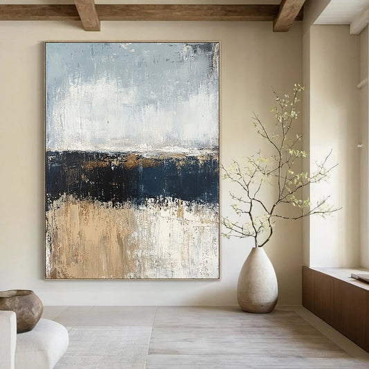 Contemporary hand-painted abstract artwork featuring a serene ocean shore in muted gray and blue tones with a neutral palette of beige and brown in oil paint. DLZ0955