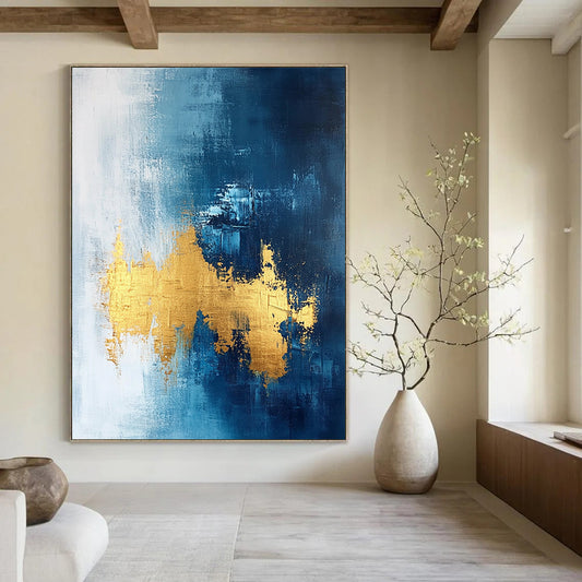 Contemporary abstract painting features gold leafing on a dark blue white and light gray background with elegant brush strokes and a sophisticated texture. DLZ0334