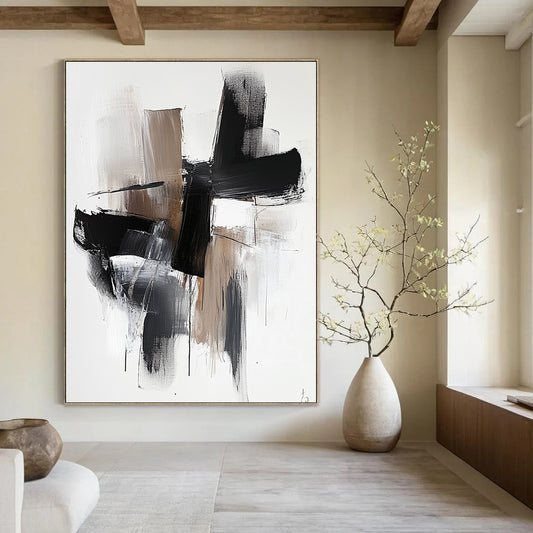Contemporary hand-painted abstract art features bold black shapes with brown tones and white highlights on a minimalist background for a striking visual impact. DLZ0315