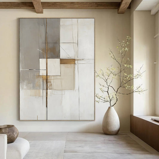 Large contemporary hand-painted abstract artwork features white gray and beige organic shapes with gold accents and heavy brushwork on a minimalist background. DLZ1742