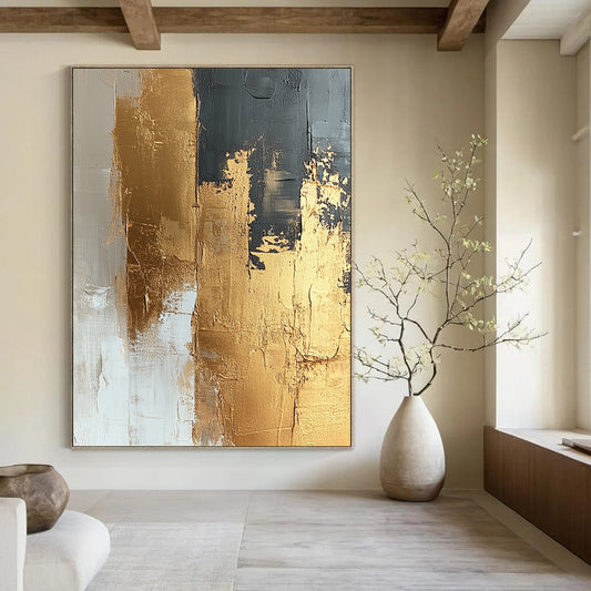 Contemporary abstract painting featuring textured gold foil on a beige and white canvas showcasing dynamic brushstrokes and a refined neutral palette. DLZ1019