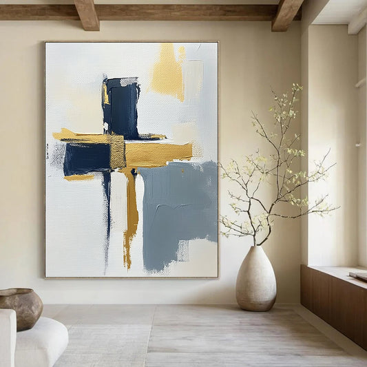 Contemporary hand-painted abstract art featuring a minimalist cross design on a textured canvas with gold highlights navy blue and gray accents. DLZ0592