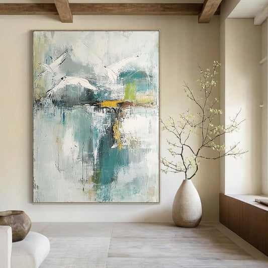 Contemporary hand-painted abstract artwork features neutral hues with teal and gold accents soft watercolors evoke birds over a lake with serene reflections. DLZ0758