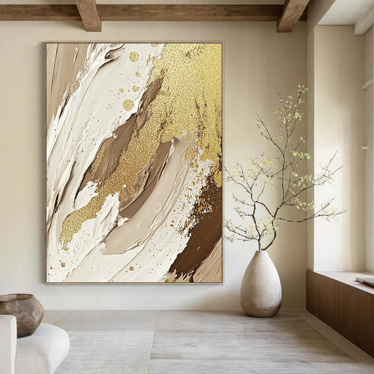 Large contemporary hand-painted abstract artwork featuring textures of cream, beige, and white with gold foil accents and glitter for an elegant touch. DLZ1188