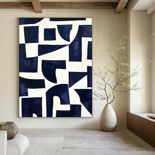 Contemporary hand-painted abstract art features navy blue shapes on a white background inspired by Matisse's cutouts with dark indigo and off-white accents. DLZ1430
