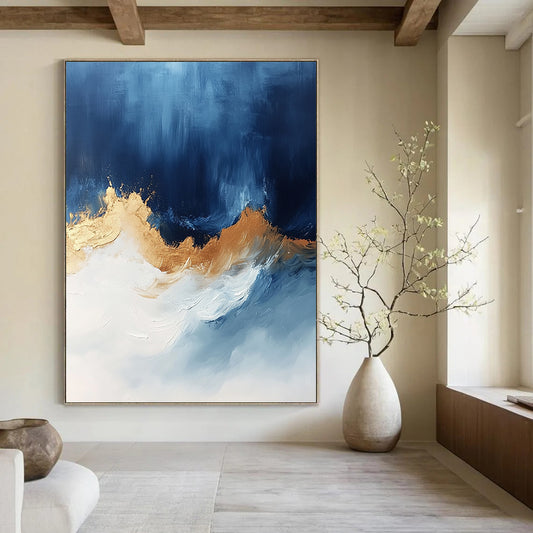 Contemporary abstract art features bold blue white and gold hues with sweeping brushstrokes energizing the canvas creating depth and visual allure. DLZ0335