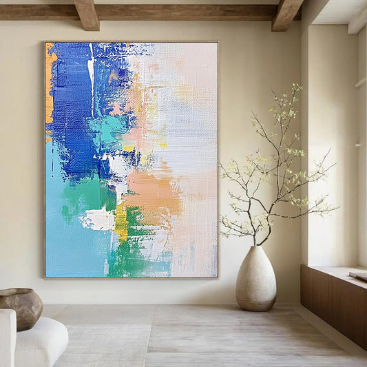 Contemporary hand-painted abstract artwork features soft pastel shades of blue and white with hints of green and beige, enhanced by dynamic brush strokes and mixed media. DLZ0657