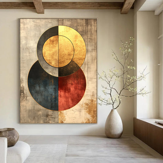 Contemporary hand-painted abstract art in gold and grey features retro circles with a grainy texture and minimalist background for timeless elegance. DLZ0266