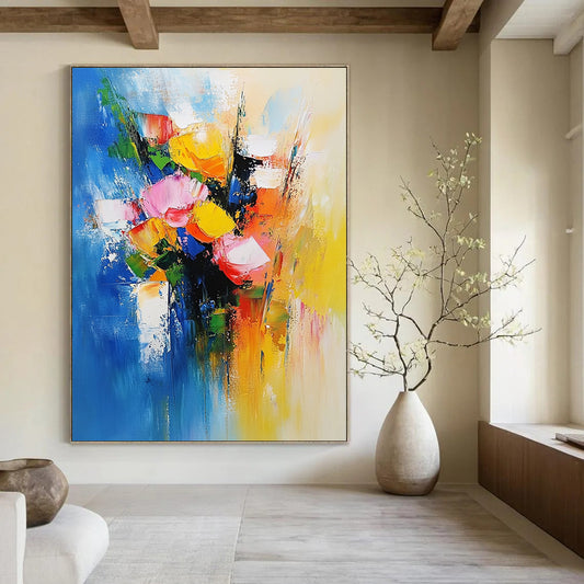 Bold contemporary abstract painting featuring vibrant flowers against soft blue and yellow tones evoking joy and vitality with dynamic brushwork. DLZ0374