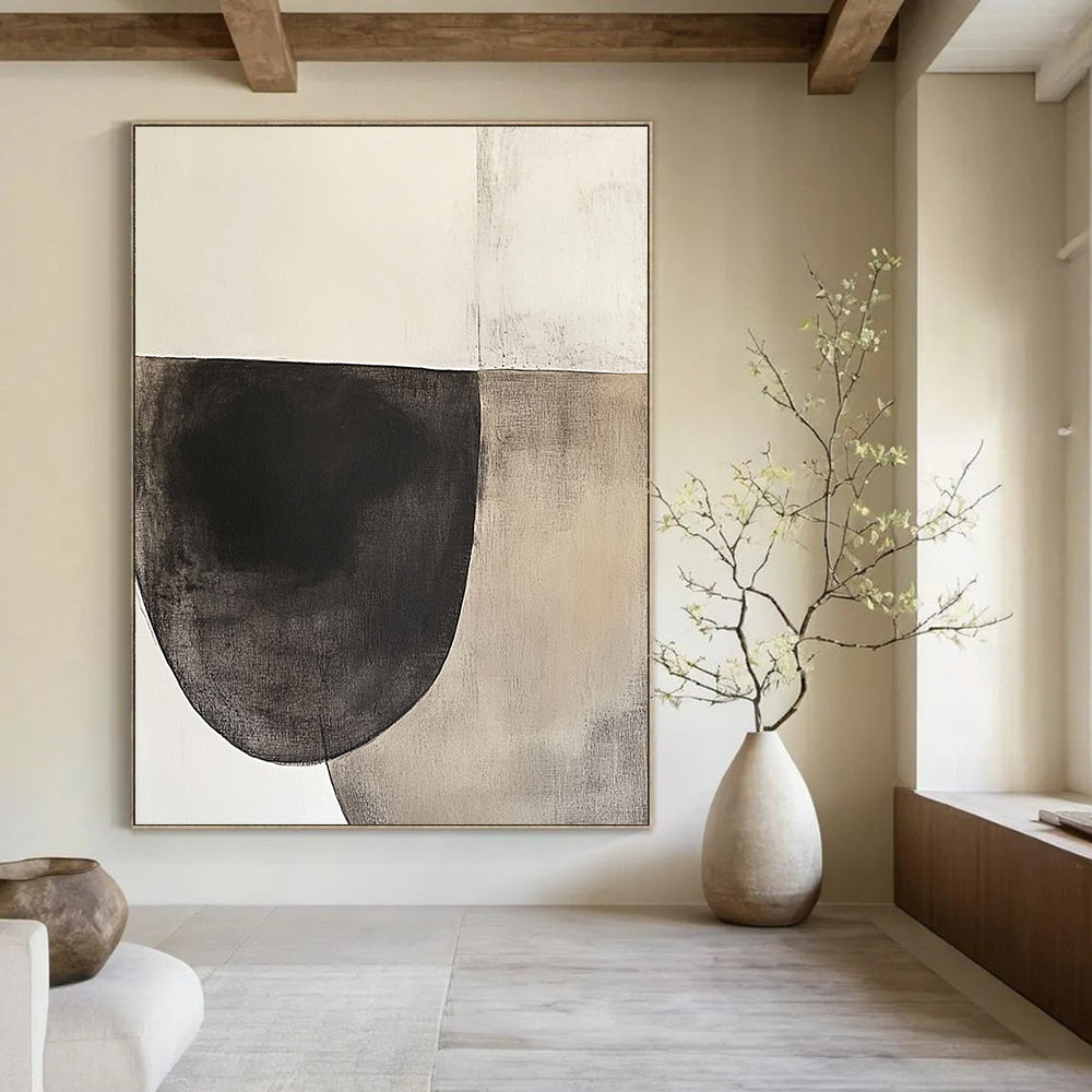 Contemporary hand-painted abstract artwork featuring an oval shape in dark charcoal and beige tones on textured white paper, inspired by minimalist design. DLZ0965