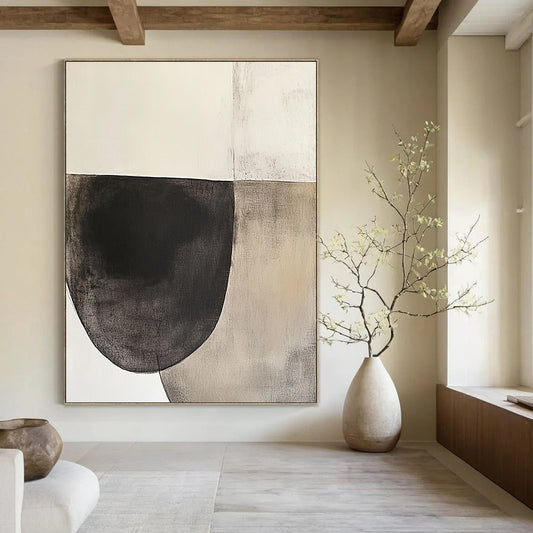 Contemporary hand-painted abstract artwork featuring an oval shape in dark charcoal and beige tones on textured white paper, inspired by minimalist design. DLZ0965