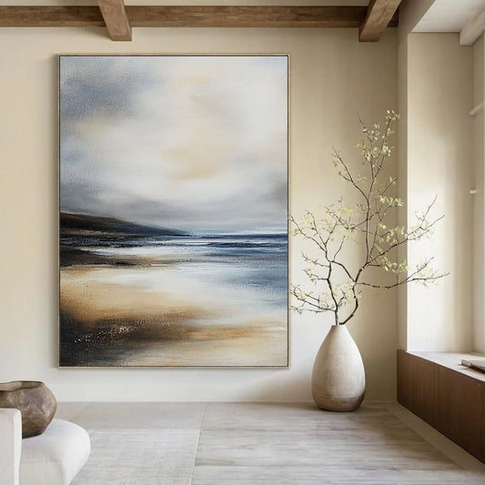 Contemporary hand-painted abstract art featuring a serene beach landscape with muted gray-blue and beige colors evoking tranquility and coastal essence. DLZ0283