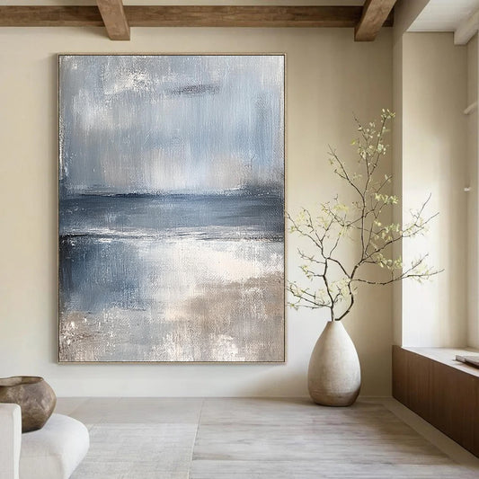 Large contemporary hand-painted abstract artwork featuring serene coastal landscape in muted tones of pale blue and gray evoking a calming sea breeze. DLZ0373