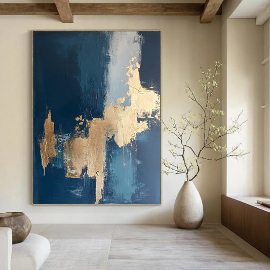 Contemporary hand-painted abstract art features intricate textures with gold leaf accents on a rich dark blue canvas. DLZ0331