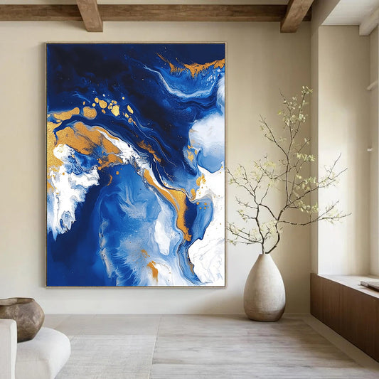 Contemporary abstract artwork featuring fluid acrylic swirls in blue and gold with textures of ocean waves white clouds and glitter accents. DLZ0327