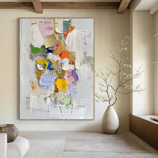 Contemporary abstract oil painting features gold leaf accents thick textures and vibrant colors on a white background with scattered colored paper pieces. DLZ0451